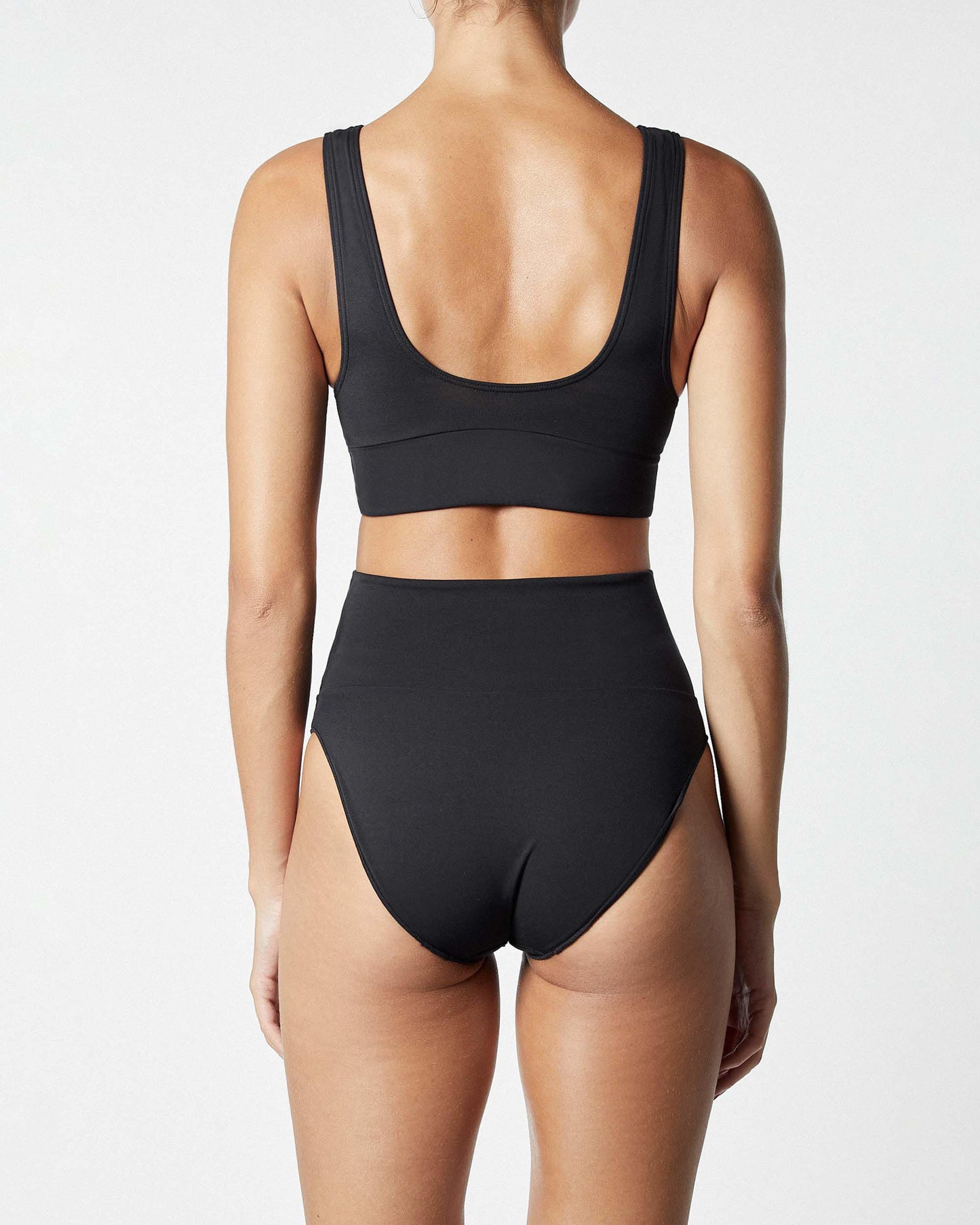 On body back of the Contour Crop Top - Black.