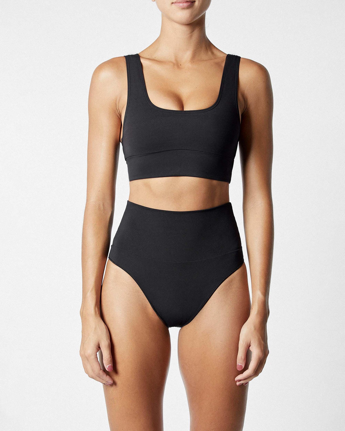 On body front of the Contour Crop Top - Black.