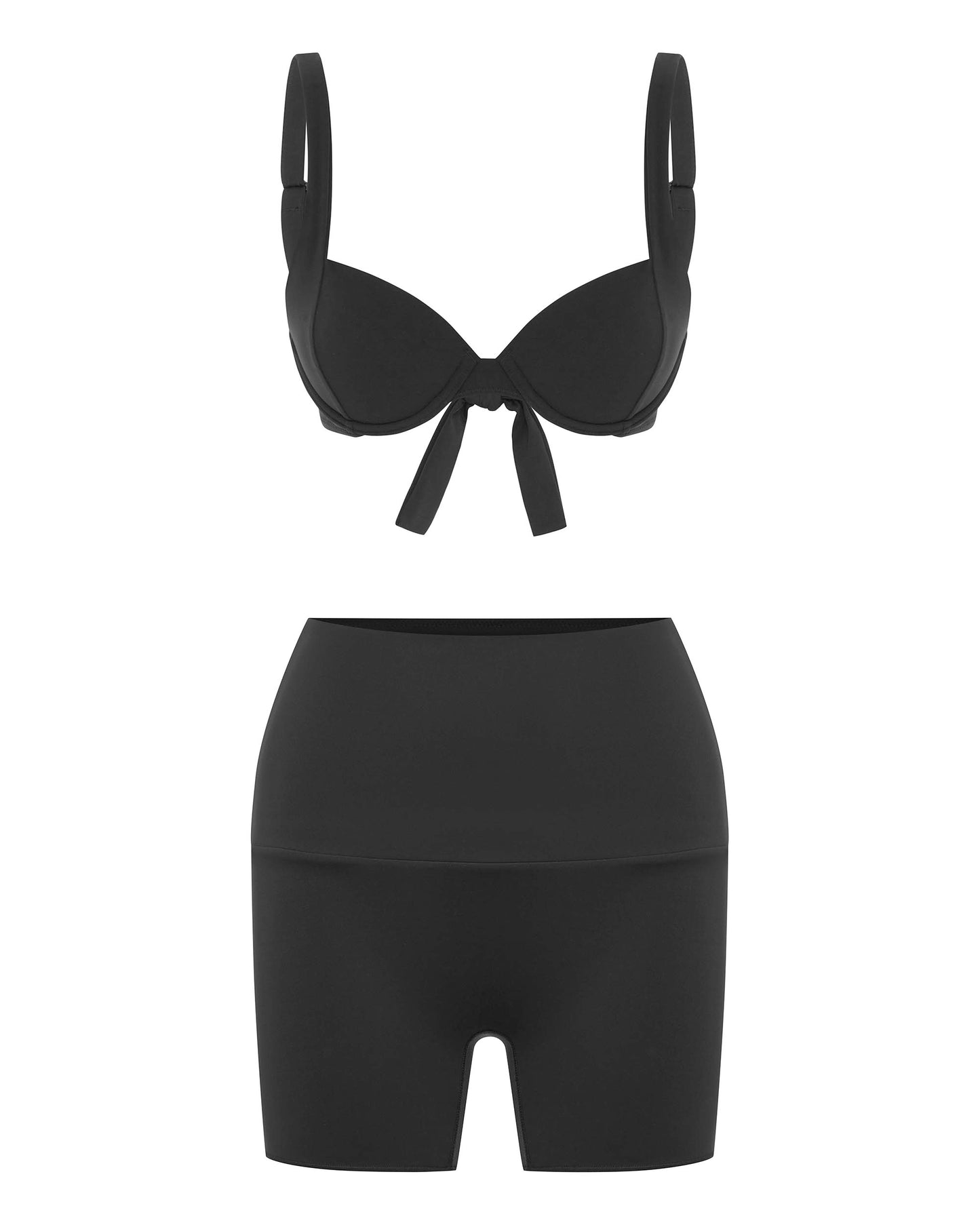 Studio image of the contour boy short in black, highlighting its compression fit and high rise waistband.