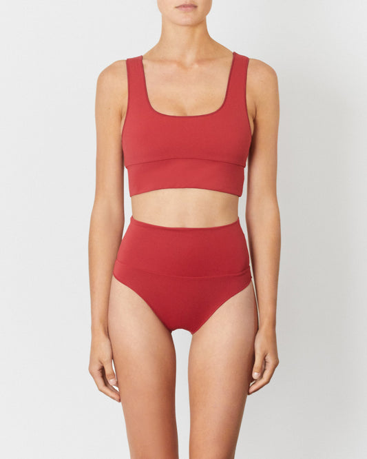 On body front of the Contour Crop Top - Chilli Red. 