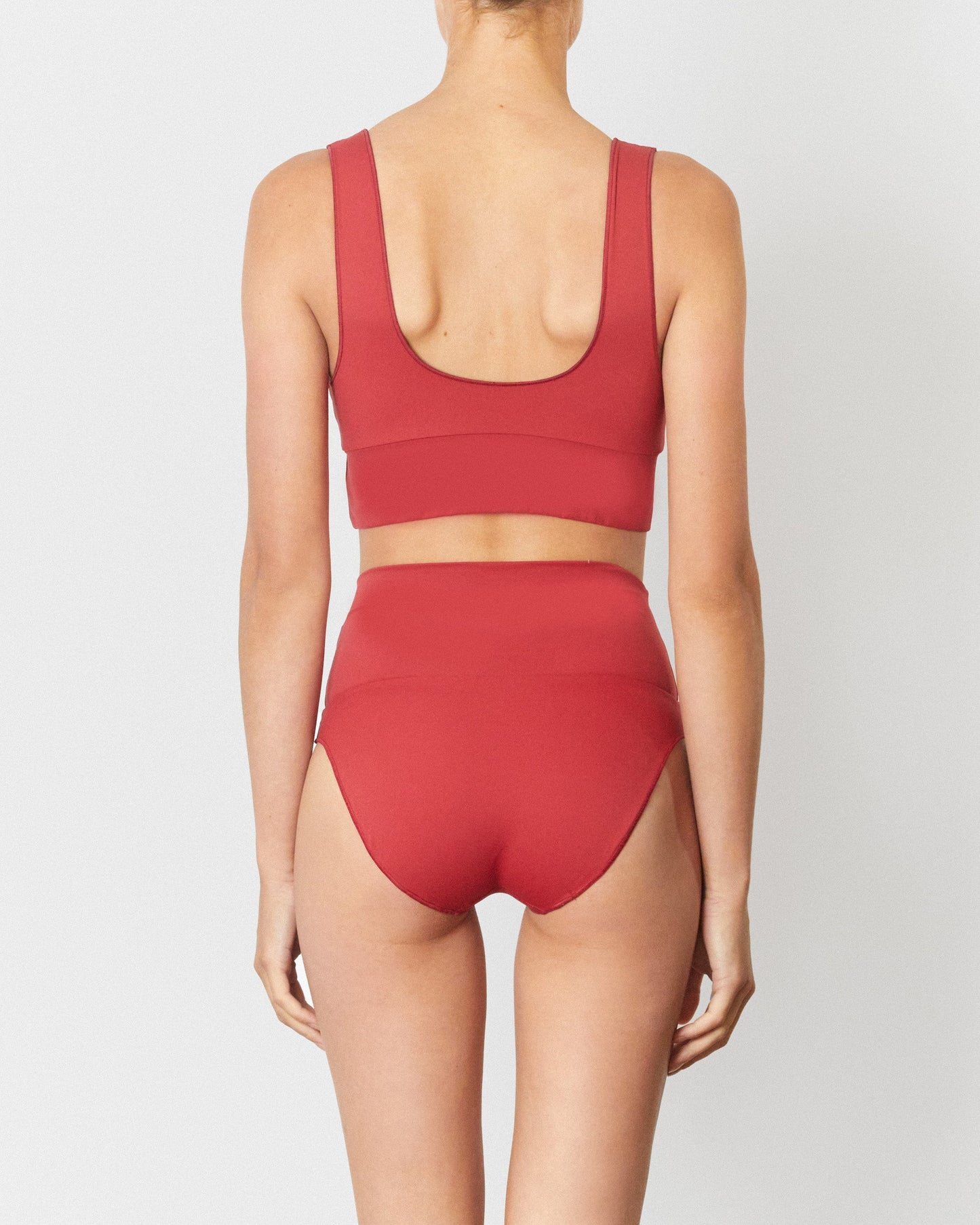 On body back of the Contour Crop Top - Chilli Red. 