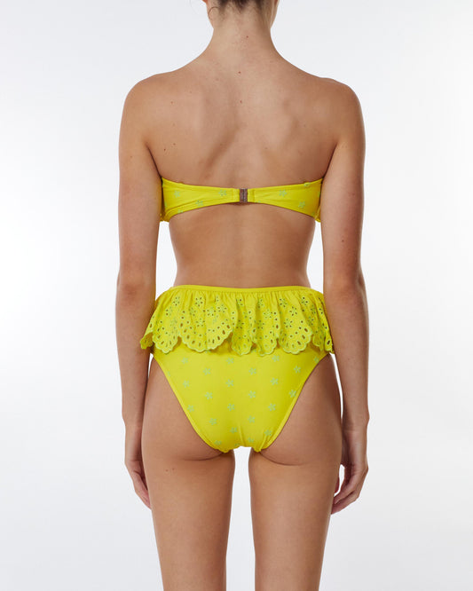 Studio image of model wearing the Waisted Frill Pant in Bonita, featuring its medium to cheeky bottom coverage. 