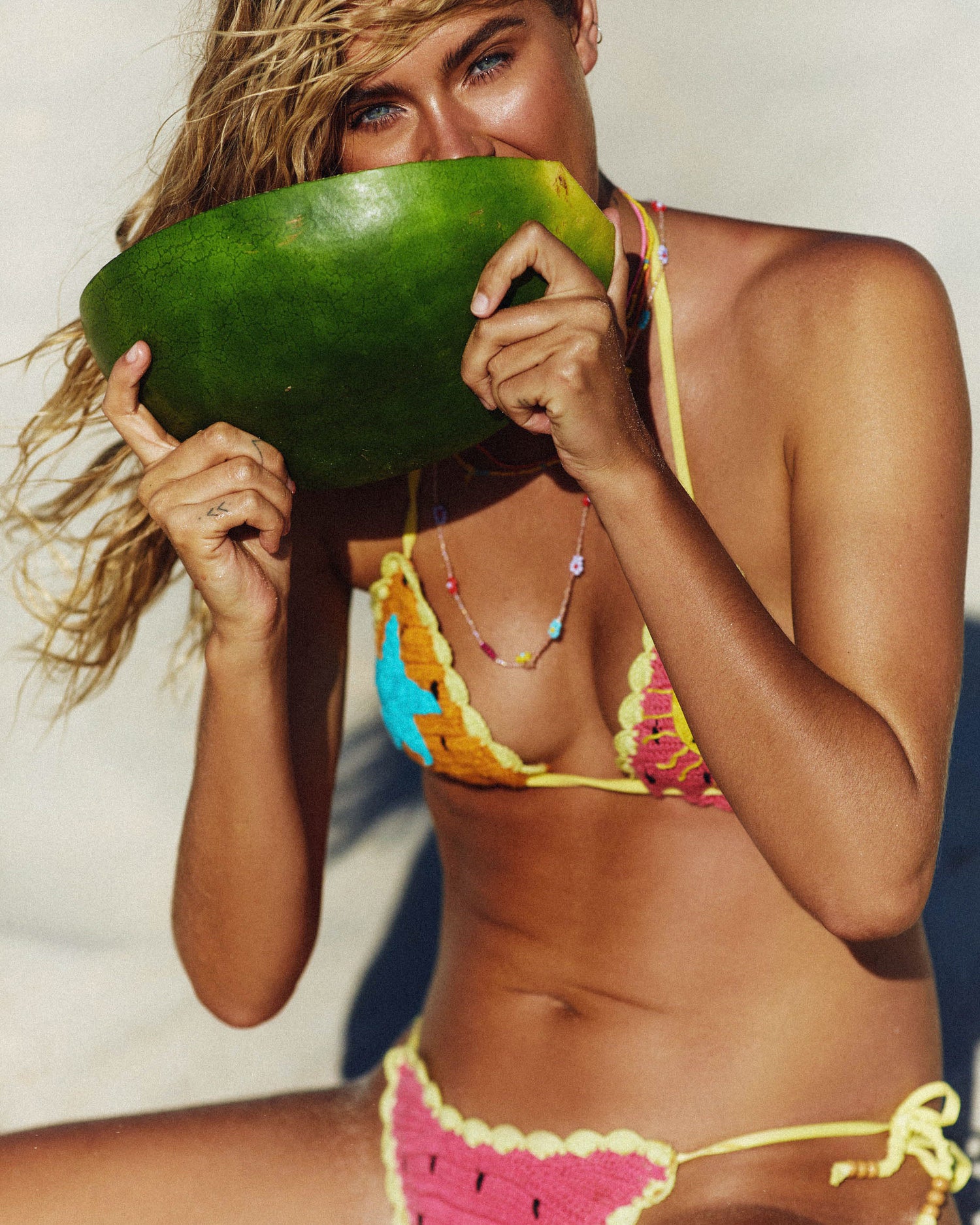 Lifestyle shot of THE CROCHET TIE PANT - BAHAMA