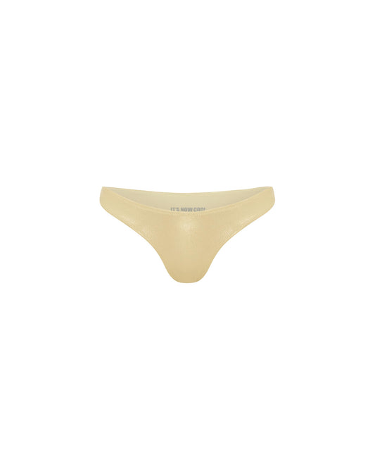 Studio image of the Luxe 90s Pant in Champagne, featuring its metallic color and high cut legs. 