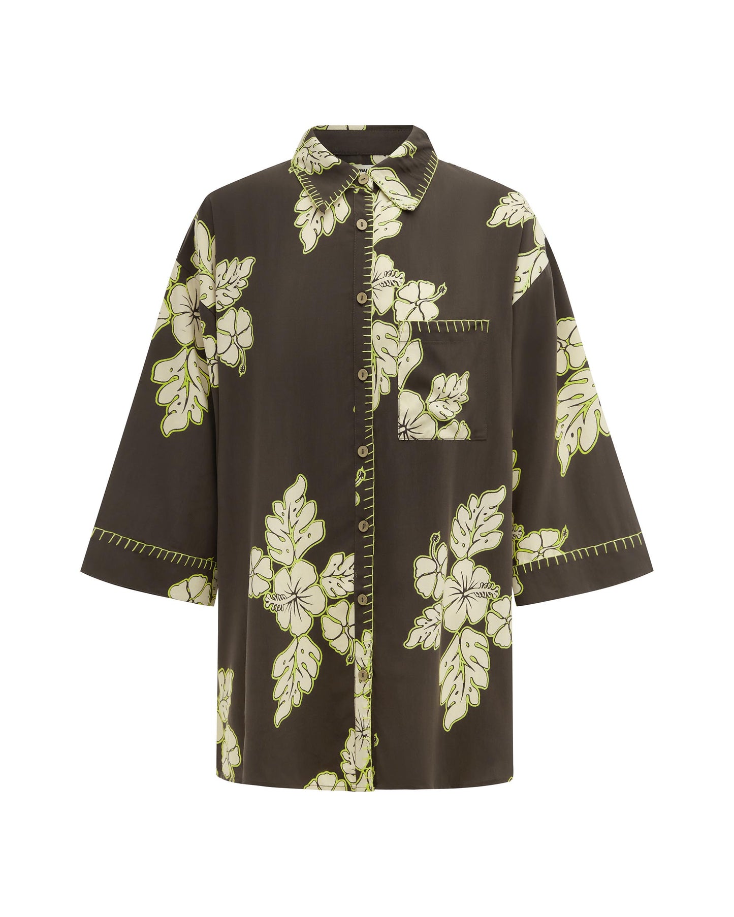 Studio image of the Vacay Shirt in Hibiscus, featuring its floral print and button up design. 