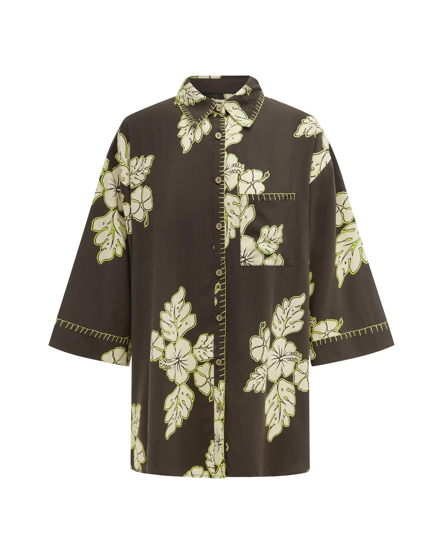 Studio image of the Vacay Shirt in Hibiscus, featuring its floral print and button up design. 