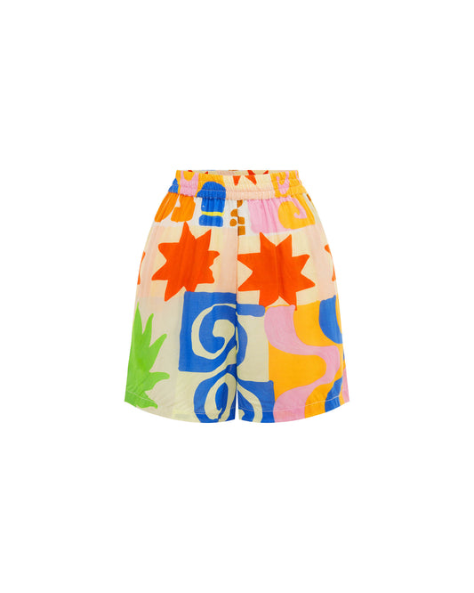 Studio image of the Vacay Short in Relax, featuring its vacation-inspired print and elastic waistband. 