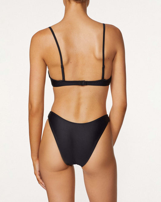 On body back of the Push Up Top - Black. 