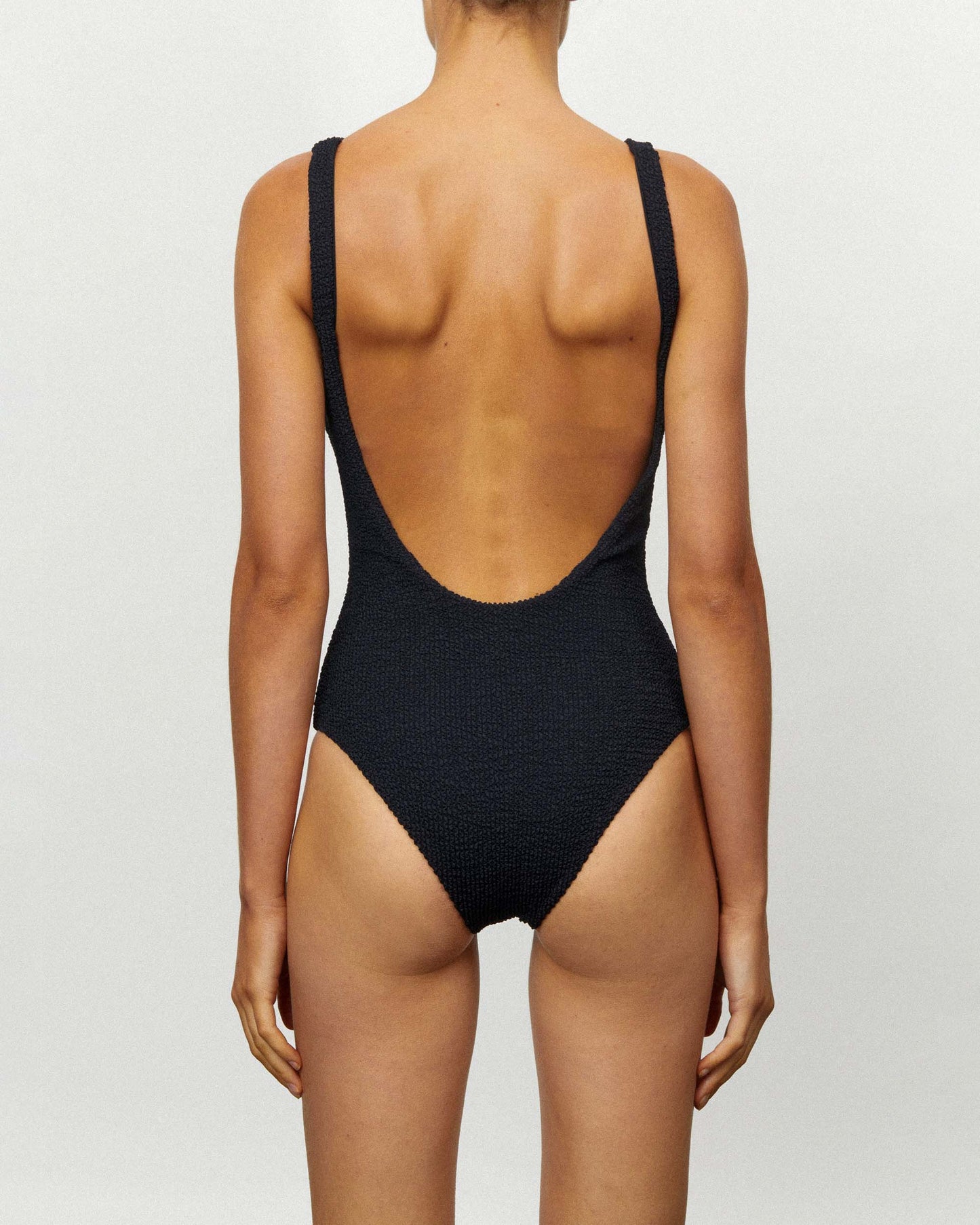 On body back of the THE BACKLESS ONE PIECE - CRIMPED BLACK