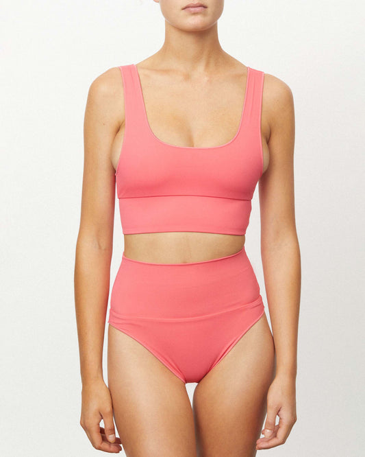 On body front of the Contour High Waist Pant - Calypso. 