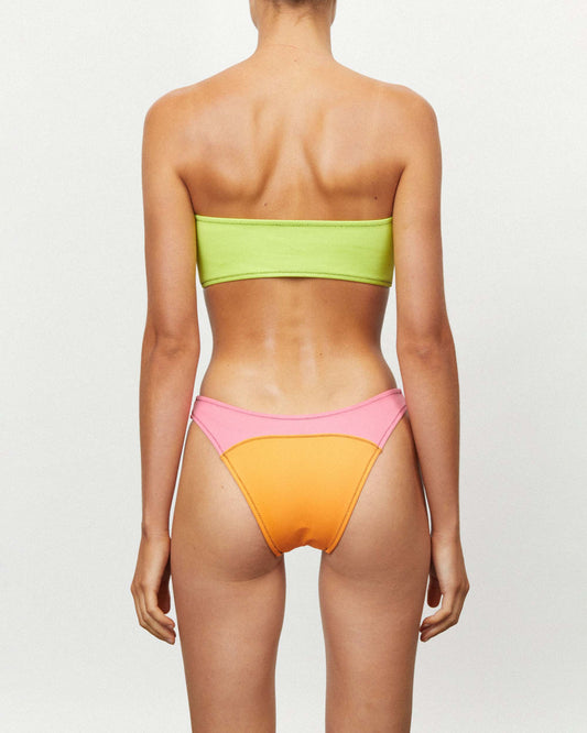 Studio image of the back of the Neo Curve Pant in Banzai. 